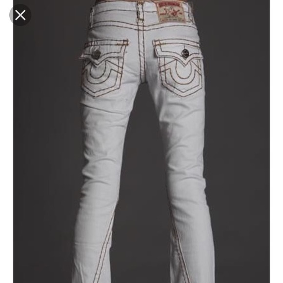 white true religion jeans with red stitching